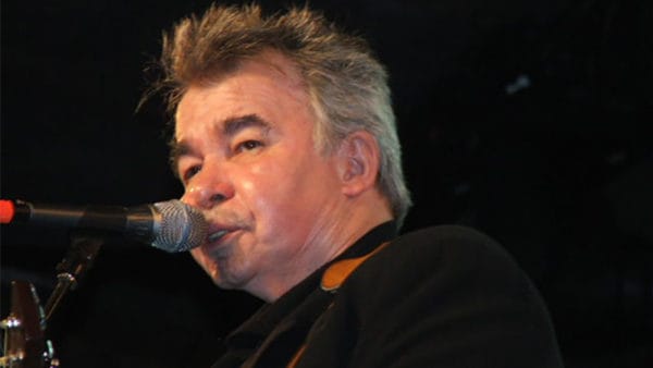 Update: Singer John Prine is in stable condition, his wife says