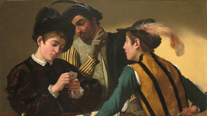 Three men are engaged in a game of primero, a forerunner of poker. The mark, far left, is unaware that the older cardsharp at center signals his accomplice, far right,with a raised, gloved hand (the fingertips exposed, better to feel marked cards). At right, the young cheat looks expectantly toward the mark, and reaches behind his back to pull a hidden card from his breeches.