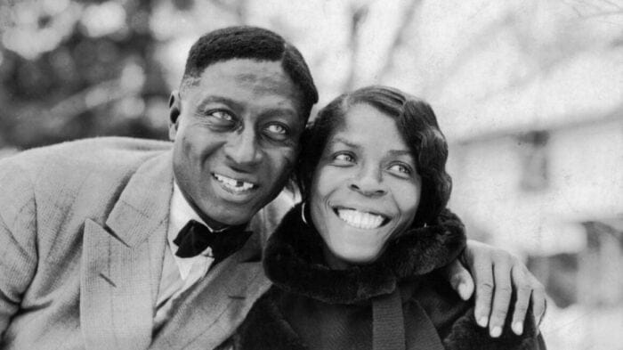 young black couple smiling
