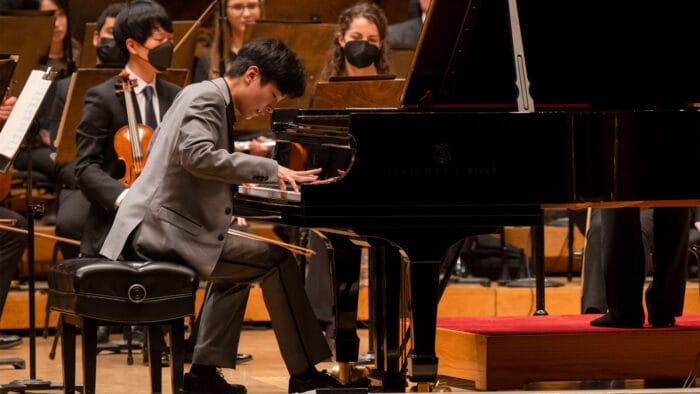 pianist Noah Kim onstage at symphony center