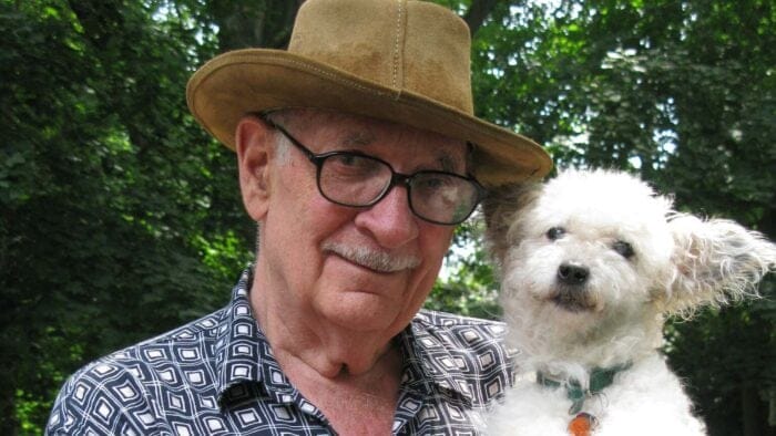 Classical composers pets: George Crumb holding a dog, Yoda