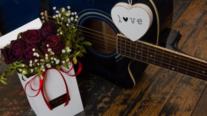 a guitar and bouquet
