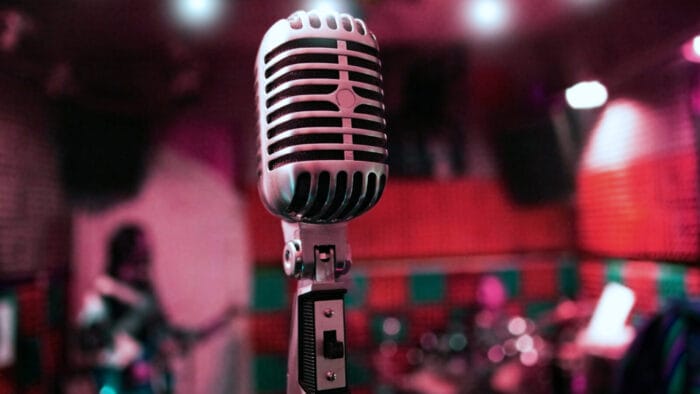 a microphone in a recording studio