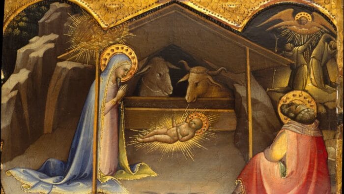 Haloed Man and haloed woman with two cattle lookng over a haloed baby. An angel watches from above.