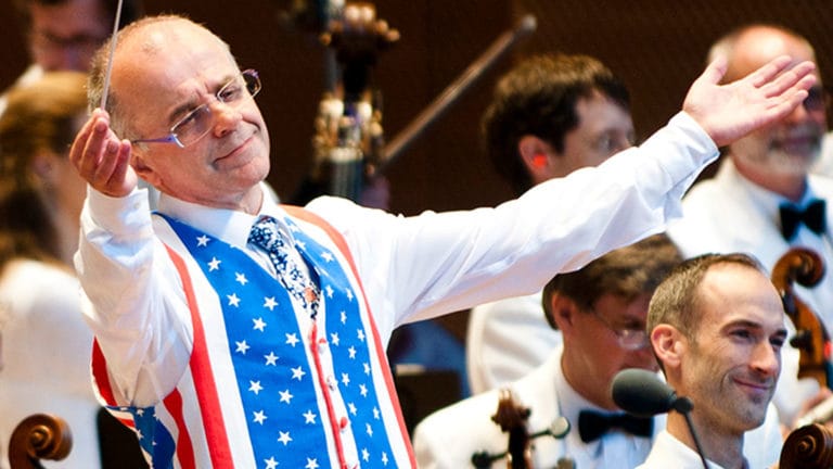 Guest conductor Christopher Bell at a previous Grant Park Music Festival Independence Day Salute concert. (Photo: Norman Timonera)