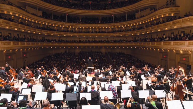 Anthony Parnther conducts the Gateways Orchestra at Carnegie Hall