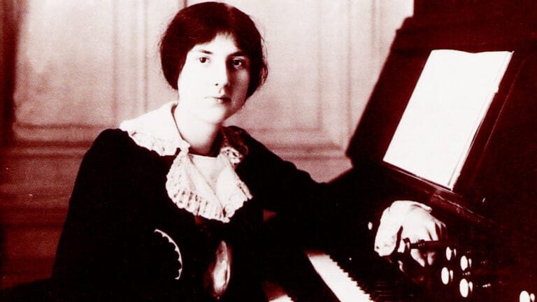 A young Lili Boulanger sits at the organ
