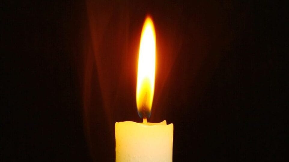 a single candle illuminated