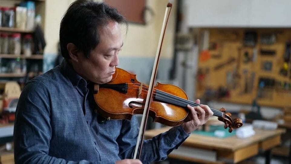 Scott Yoo plays violin in a workshop in "Now Hear This"