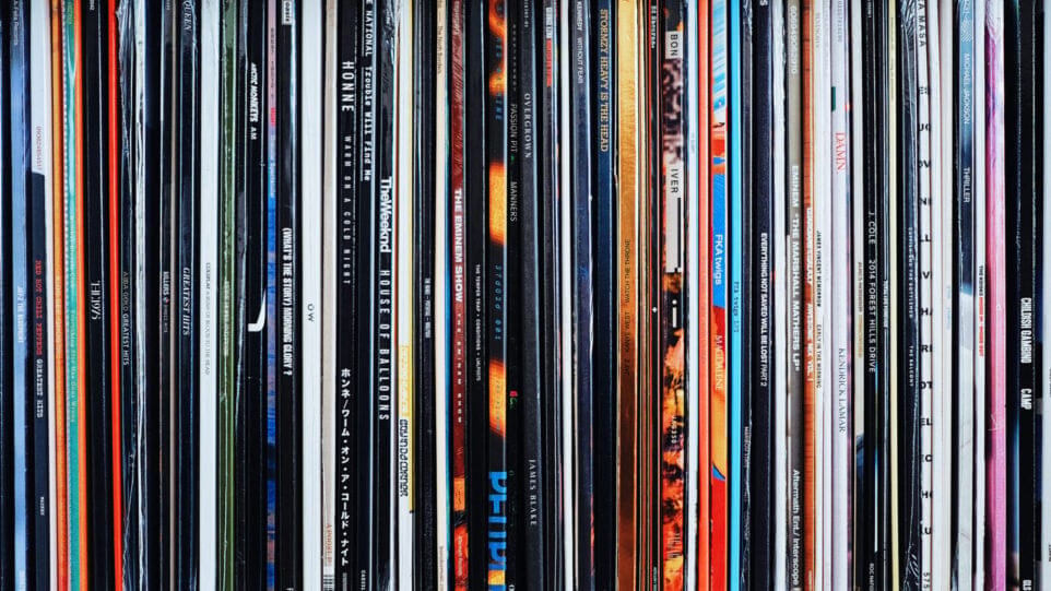 Sides of records on a book shelf