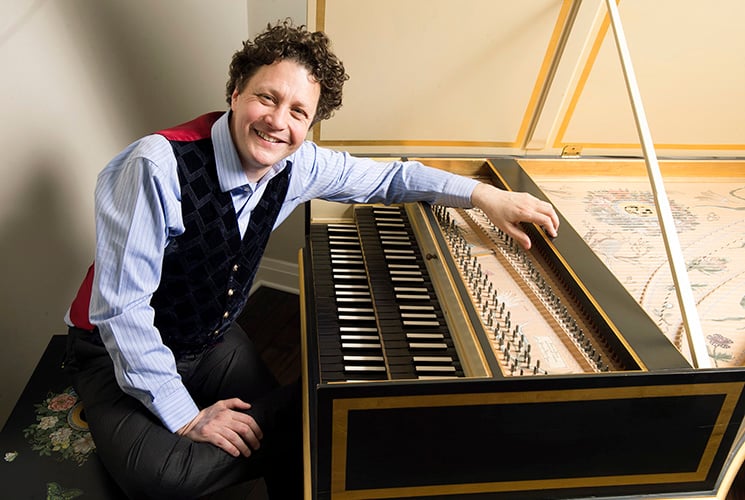 Jory Vinikour poses with a harpsichord