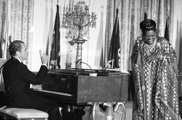 FILE - In this March 8, 1974, file photo President Nixon plays