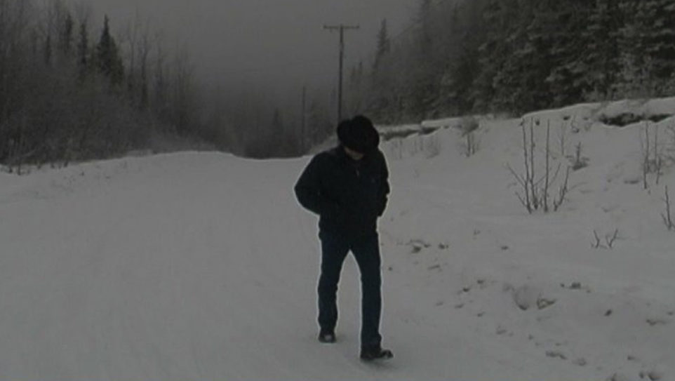 John Luther Adams trudges through the mountain snow