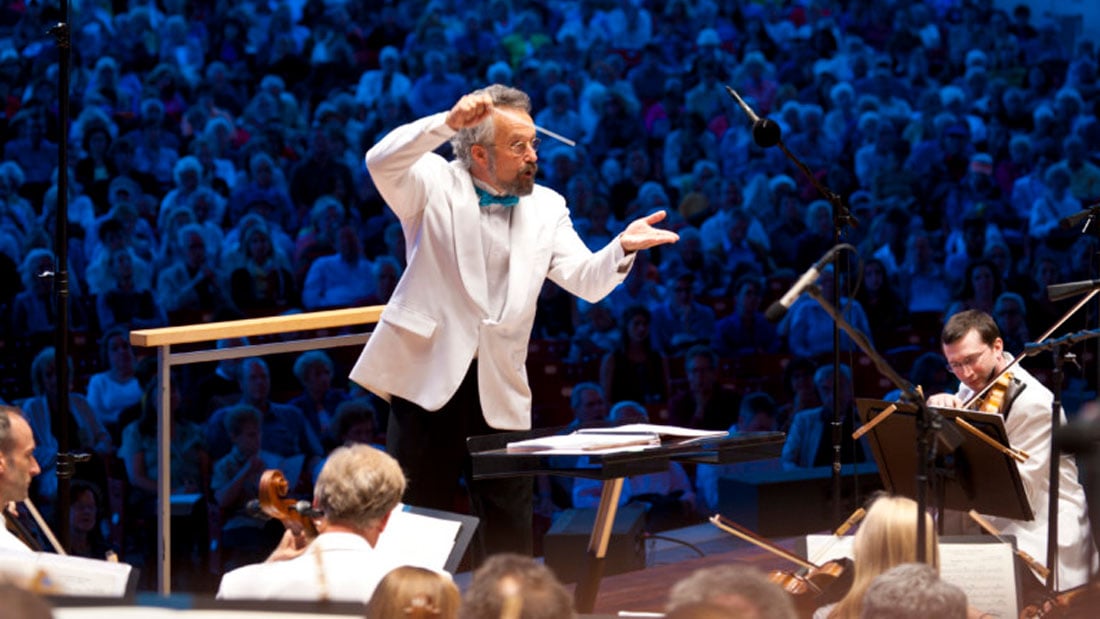 Conductor Carlos Kalmar leads the Grant Park Orchestra.