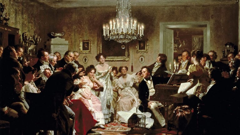 oil painting of Franz Schubert at the piano in a musical salon setting, surrounded by guests.