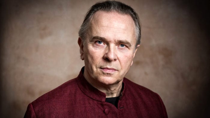 Portrait of Sir Mark Elder looking serious