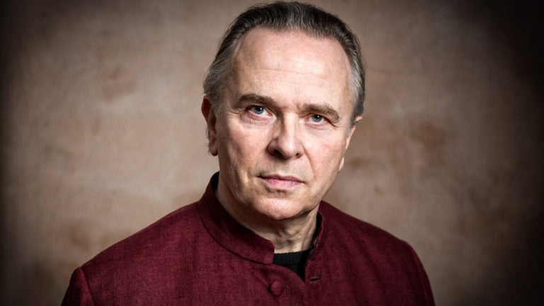 Portrait of Sir Mark Elder looking serious