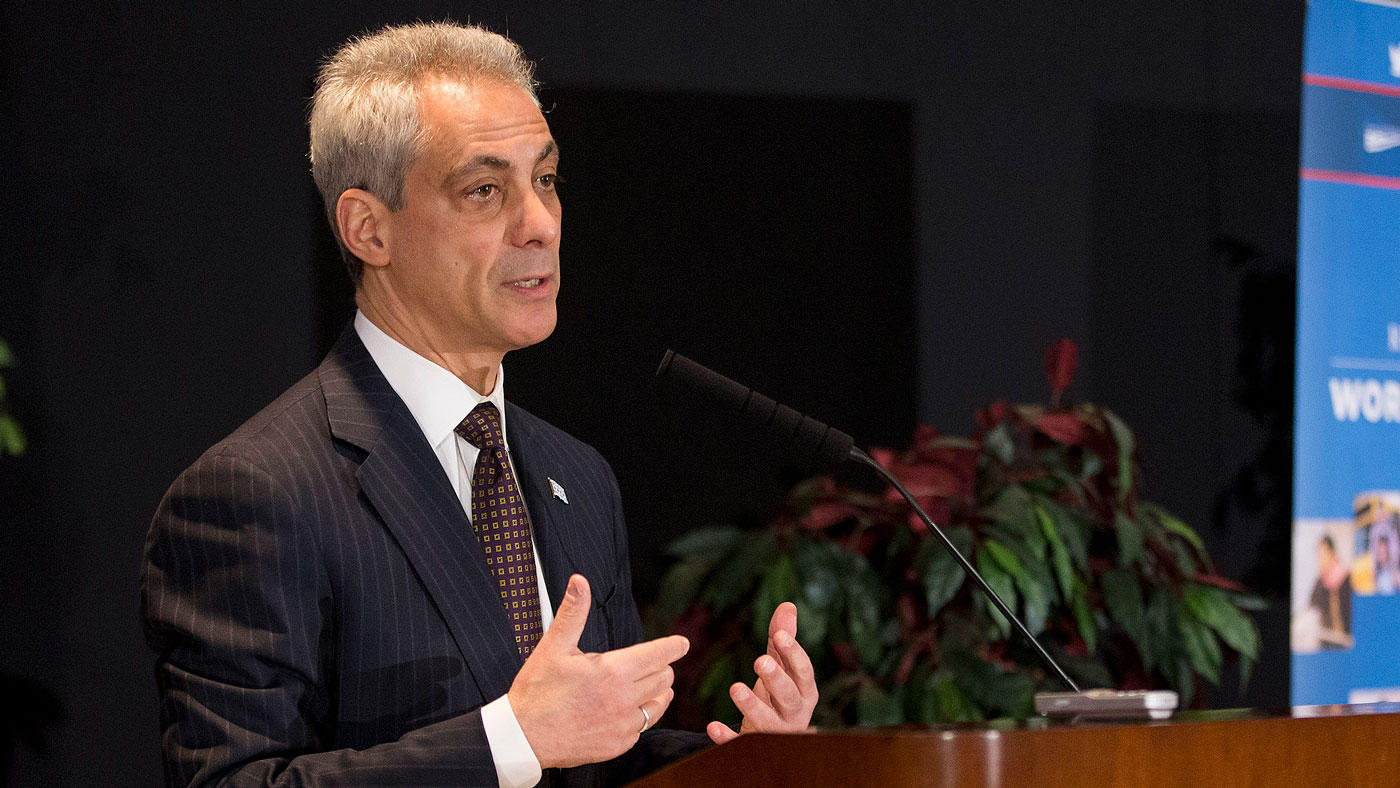 Rahm Emanuel speaking at a lectern