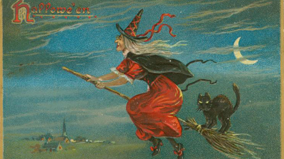 vintage greeting card with witch on a broomstick