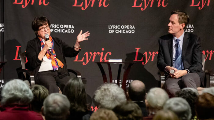 Panelist Sister Helen Prejean speaks while composer Jake Heggie listens in front of an audience at a Lyric Opera-held discussion