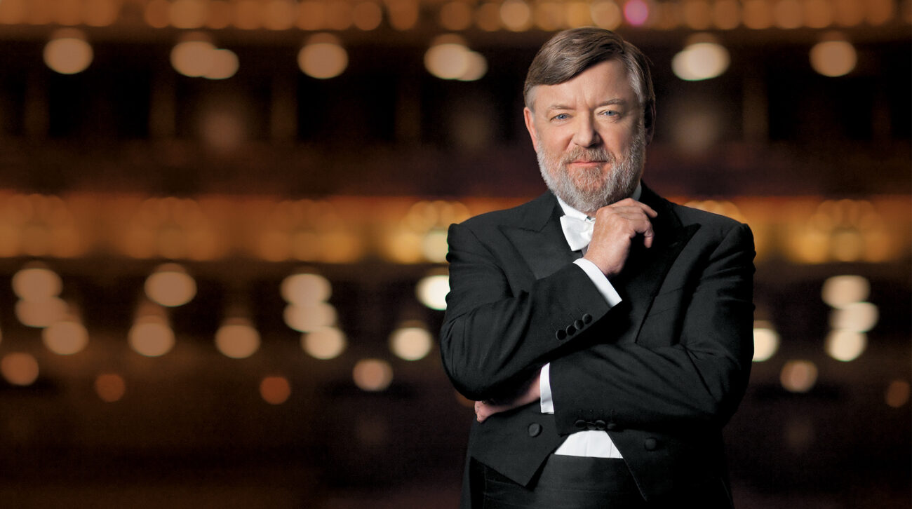 Man in formal wear in theater