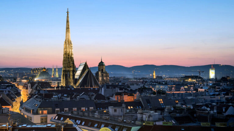 The steeple-dotted skyline of Vienna, Austria, at dusk