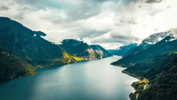 Mountain Valley with a body of water in the middle