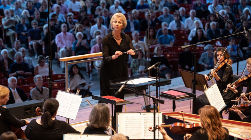 Jane Glover conducts Music of the Baroque at Millennium Park, with audience in the background