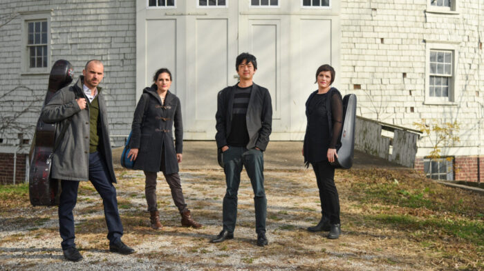Four Musicians in front of barn