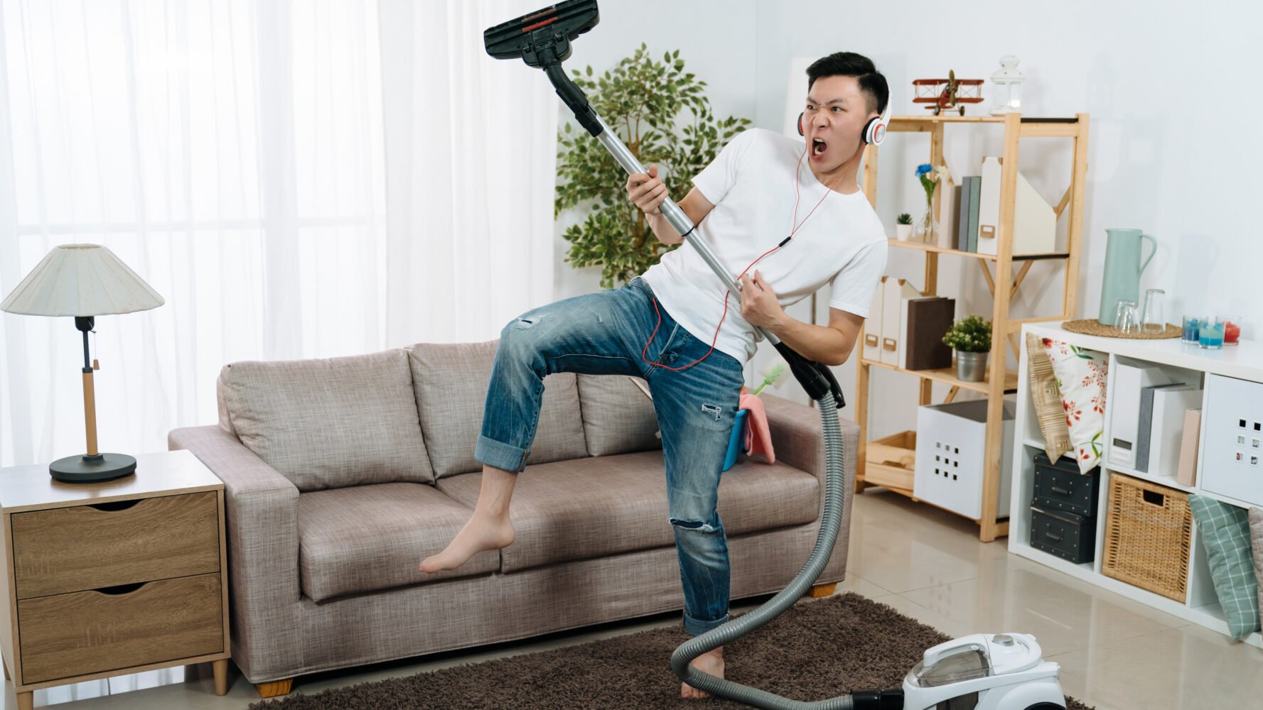 classical chores man vacuuming rock out