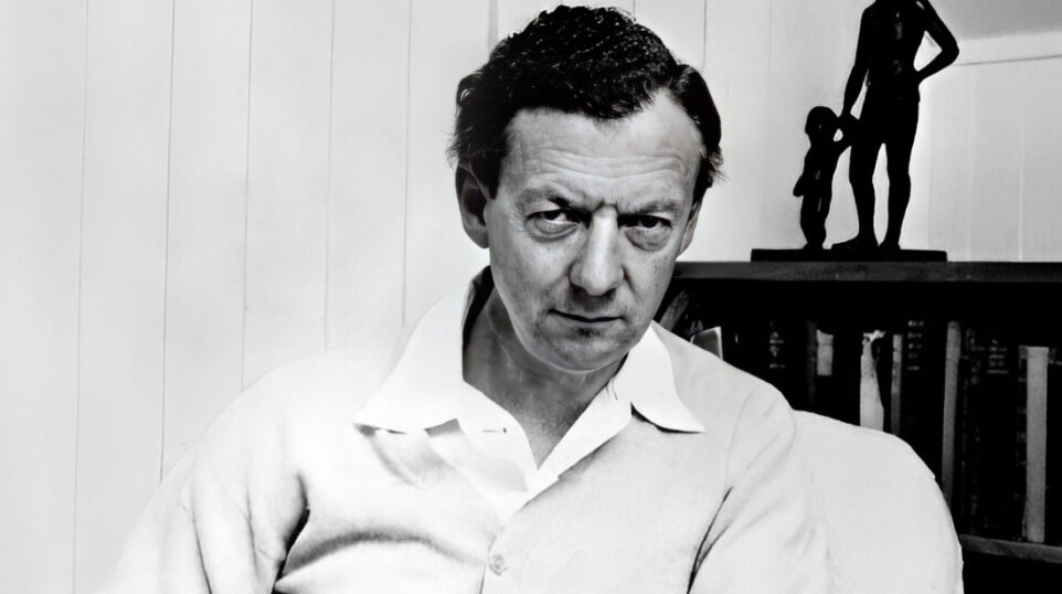 Benjamin Britten sitting in a chair