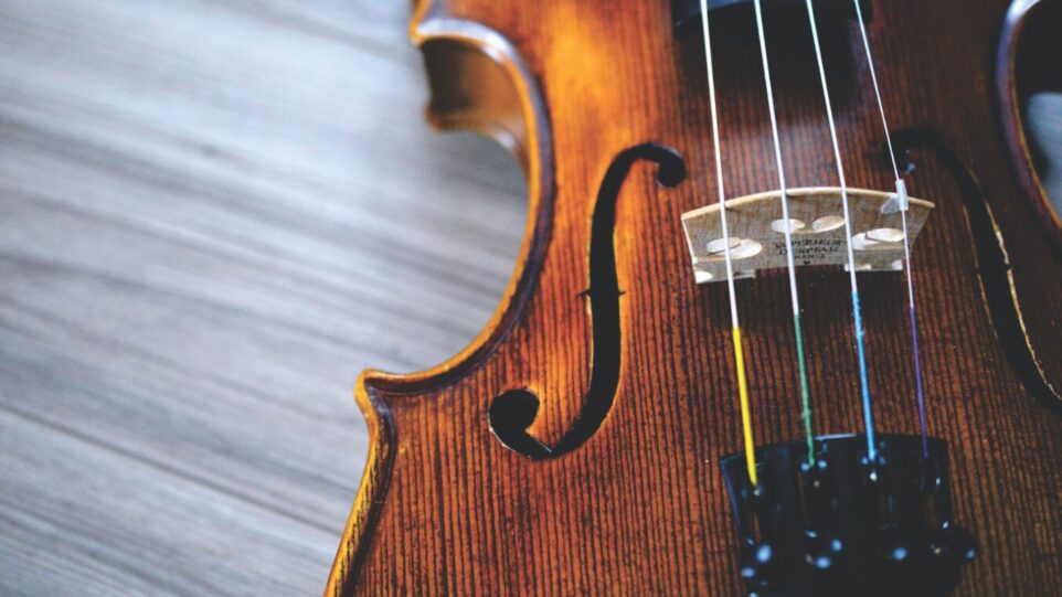 Violin laying on desk