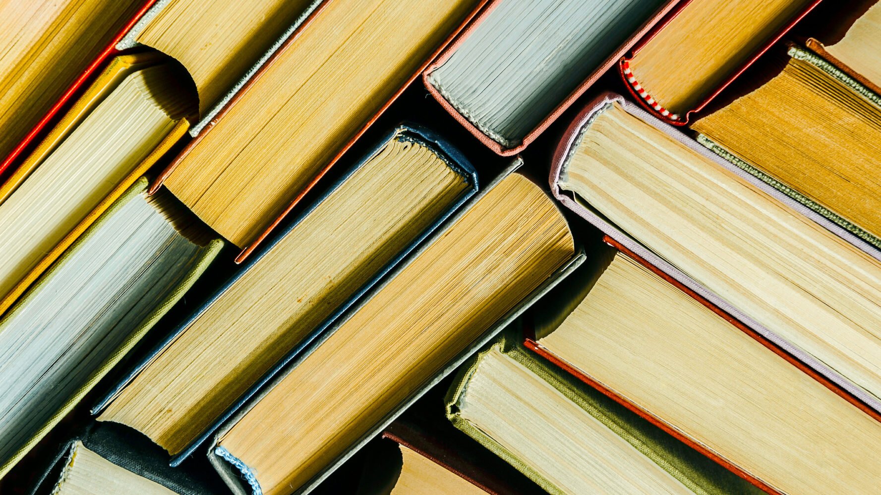 close up of as cluster of miscellaneous books