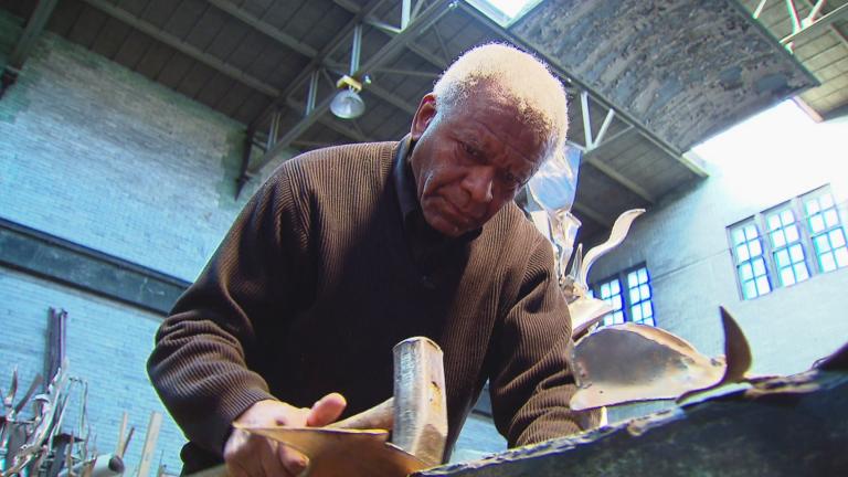 sculptor Richard Hunt hard at work in his studio