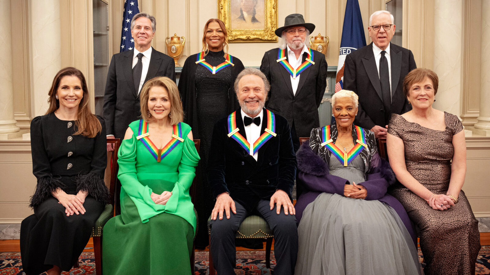 A group portrait of the 2023 Kennedy Center honorees — Queen Latifah, Barry Gibb, Renée Fleming, Billy Crystal, and Dionne Warwick —alongside US government officials and arts administrators