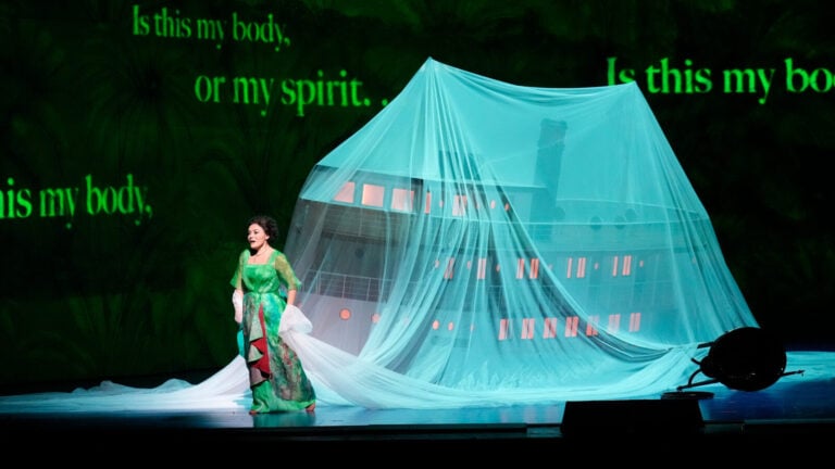 Ailyn Pérez stands spellbound in front of a model boat as the title character of 'Florencia en el Amazonas'