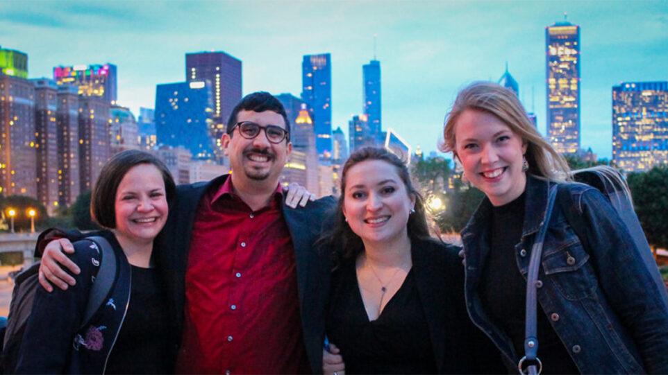 Lake Effect Clarinet Quartet poses at dusk in front of the Chicago skyline