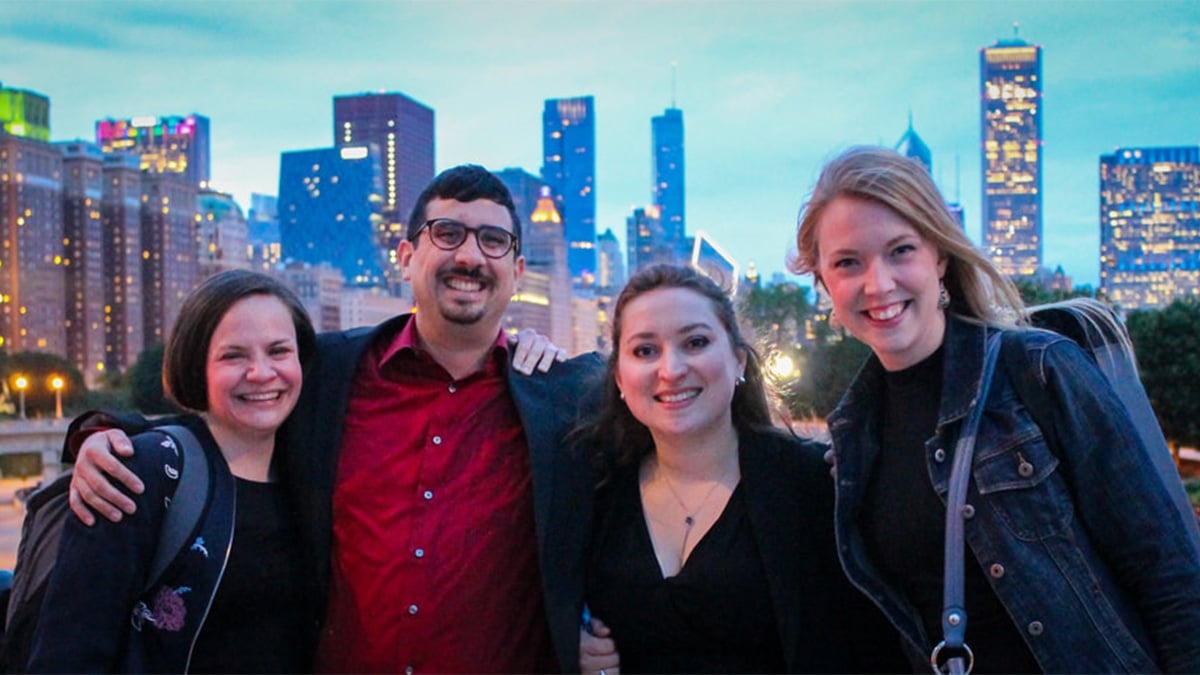 Lake Effect Clarinet Quartet poses at dusk in front of the Chicago skyline