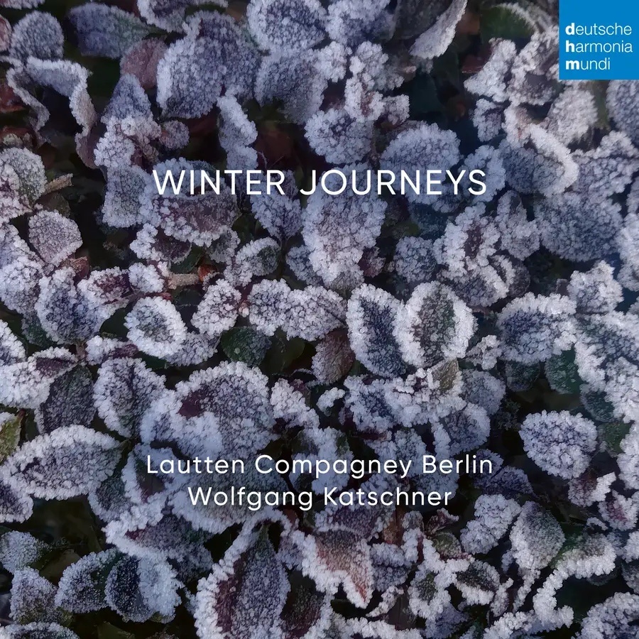 Album cover for 'Winter Journeys', showing snow-kissed foliage