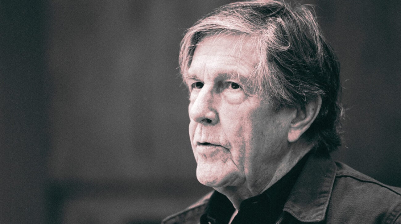 composer John Cage looks thoughtful