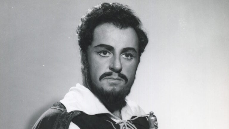 Black and white photo portrait of Carlo Bergonzi in costume and makeup as Ernani
