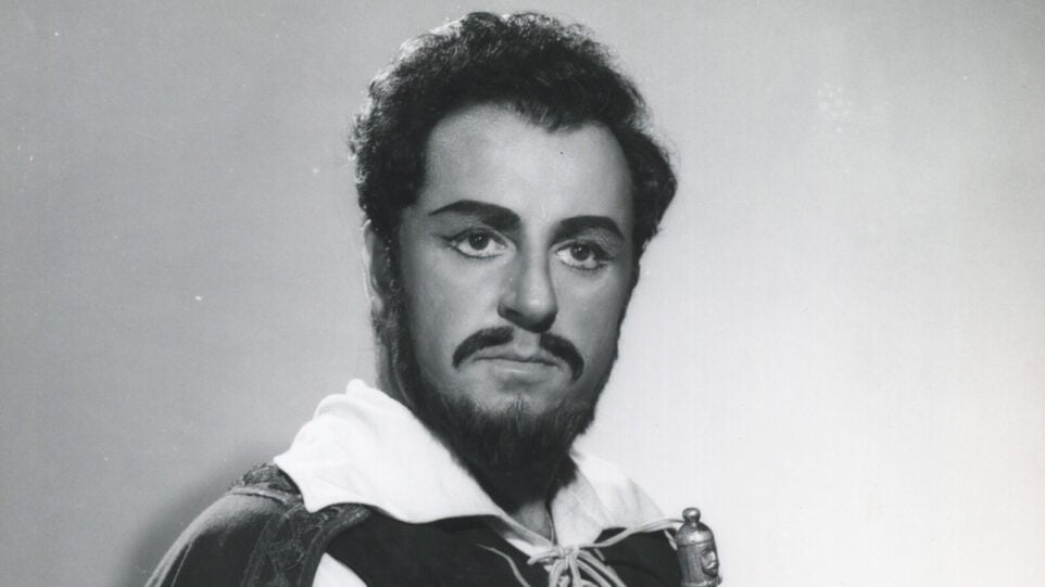 Black and white photo portrait of Carlo Bergonzi in costume and makeup as Ernani