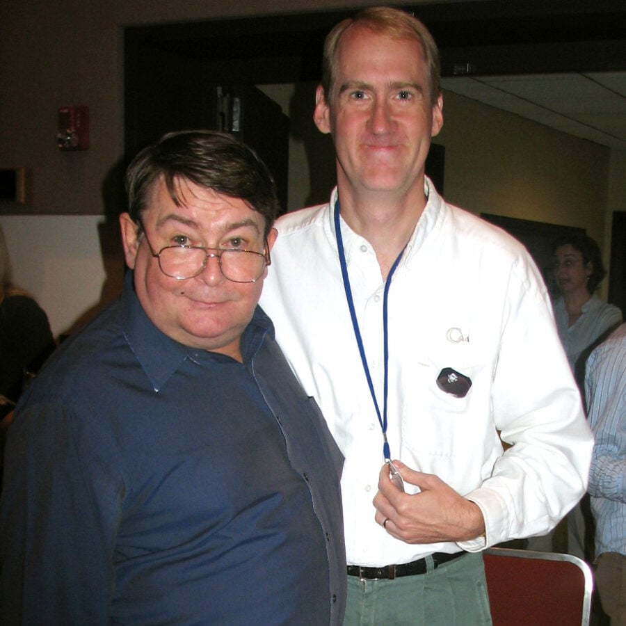 Don Tait, in blue, and Peter van de Graaff, in white, pose together