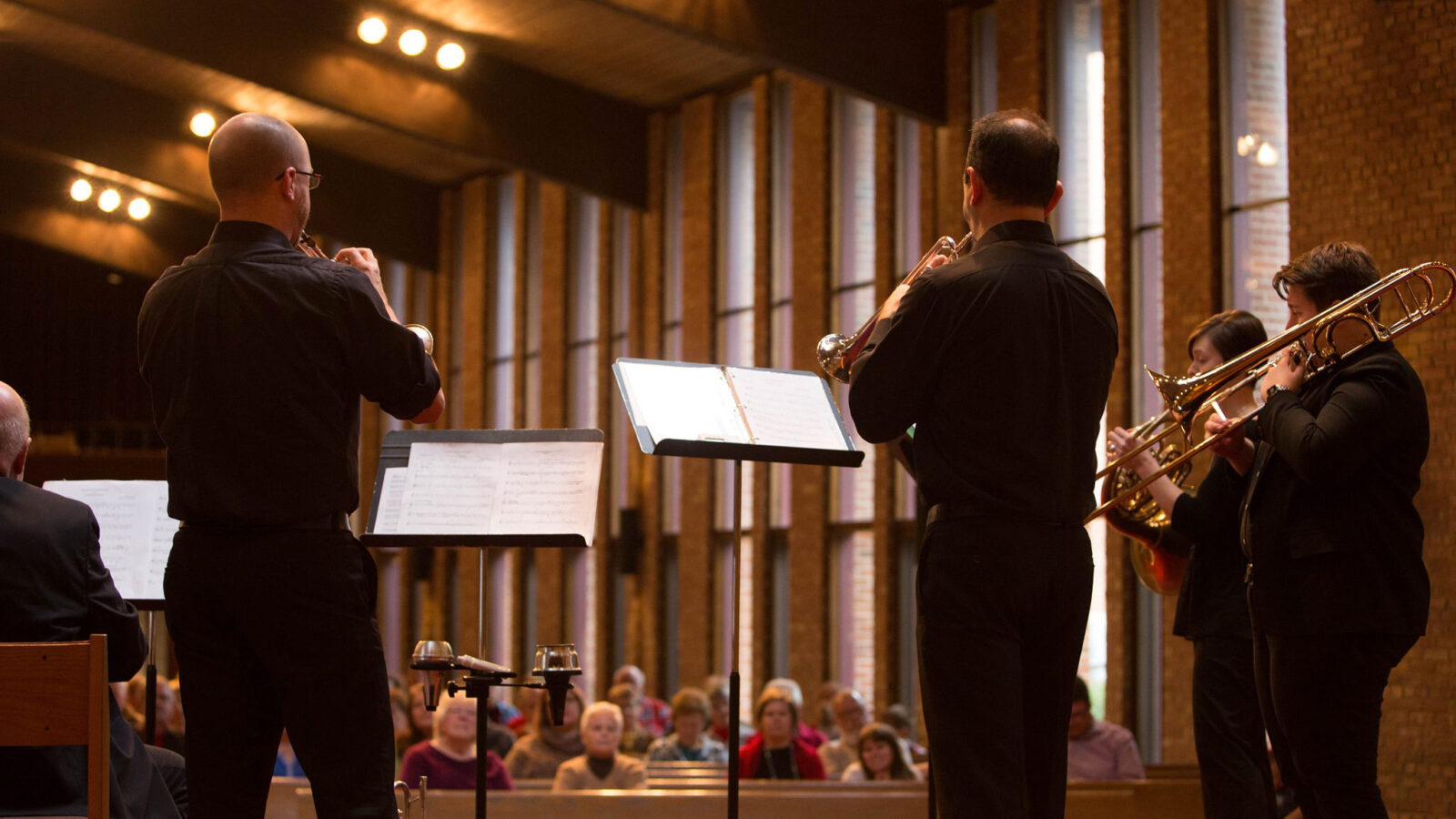 Members of the Chicago Gargoyle Brass & Organ Ensemble performing.