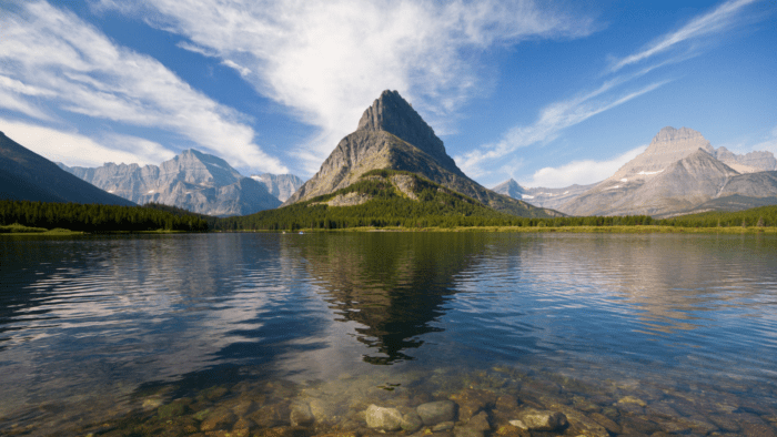 Lakeside view of Grinnell Point and Swiftcurrent Lake in Glacier National Park, Montana.