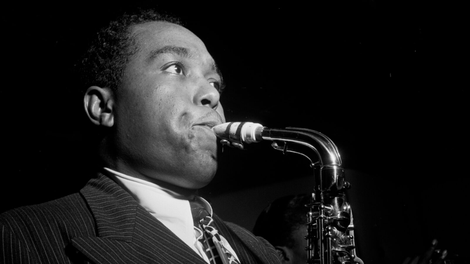 Charlie Parker plays the saxophone, 1947