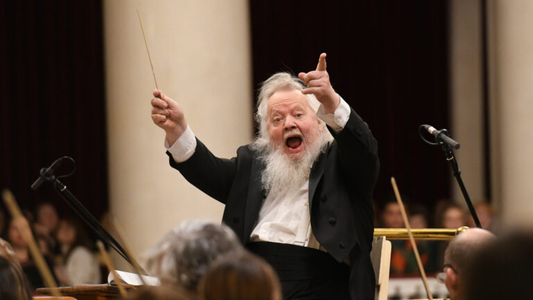 Leif Segerstsm conducts animatedly