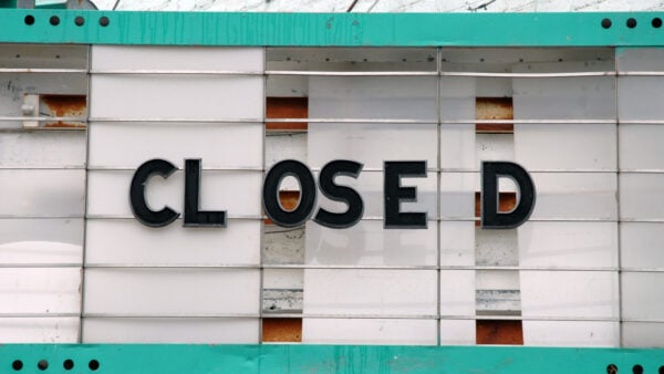rundown marquee with text "Closed"