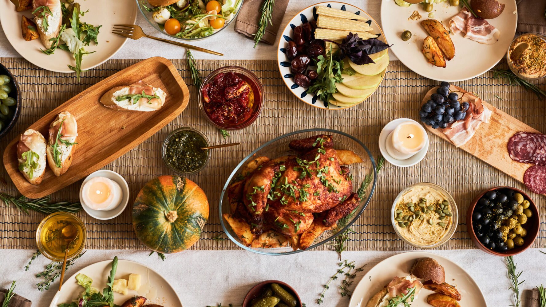 Thanksgiving feast spread with lots of side dishes