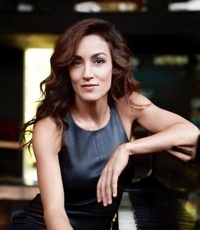Marta Aznavoorian poses with piano
